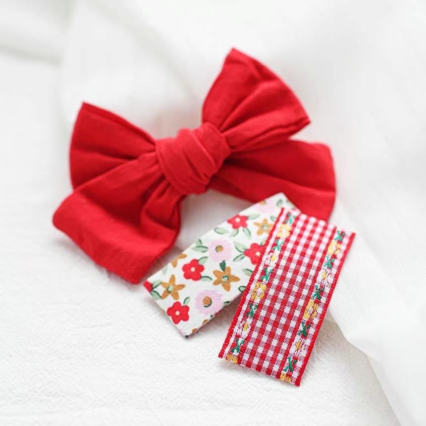 P0282 紅色蝴蝶結X花花髮夾四個裝